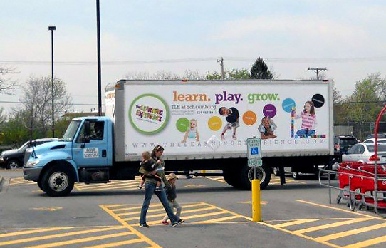 Image of truckside advertising used to reach parents of young children