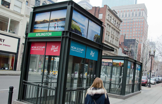Image of wrapped transit station advertising in Boston