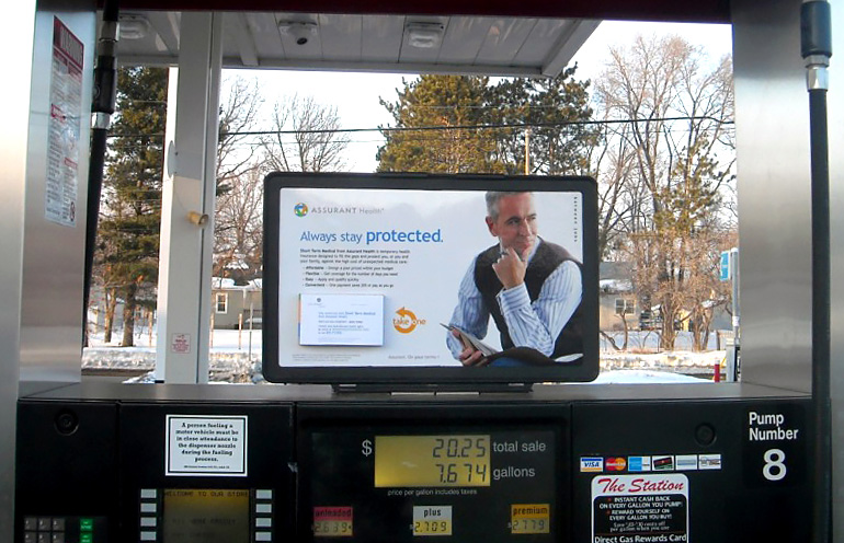 Image of a national gas station advertising campaign for an insurance provider
