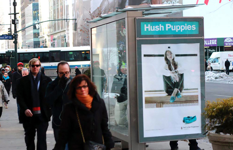 Image of transit shelter advertising in New York for a major fashion brand