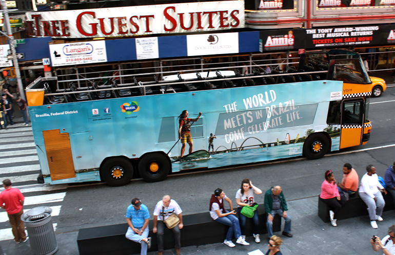 Image of wrapped double decker bus in New York's Times Square
