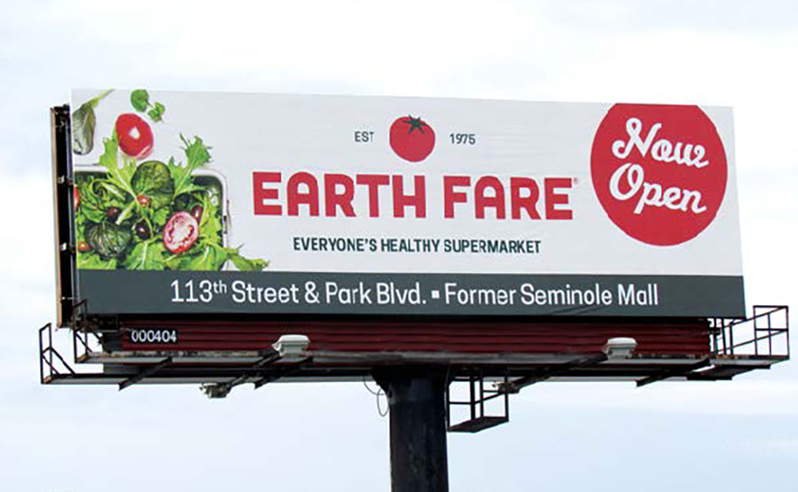 A billboard advertisement for a grocery store