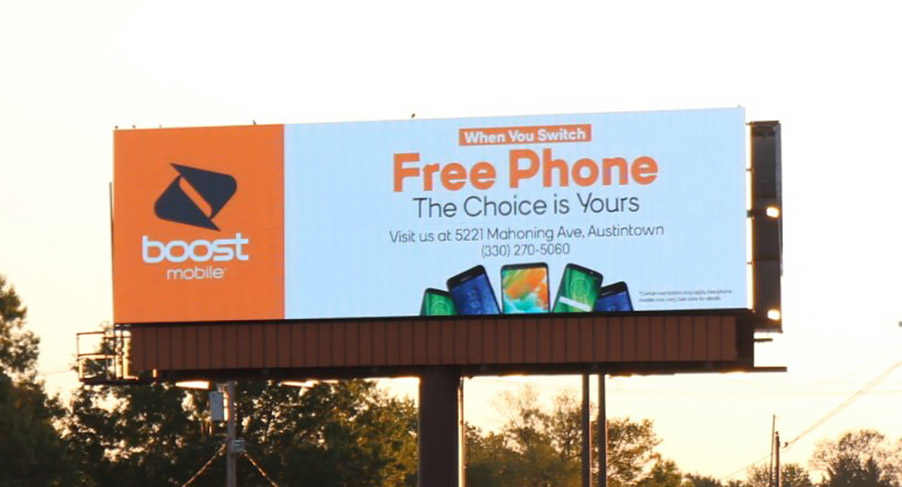 A billboard advertisement for a local cell phone store