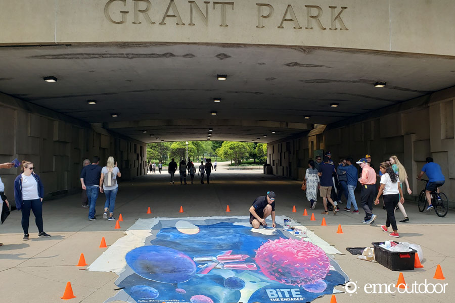 A 3D chalk art installation used to reach event attendees with Out of Home media