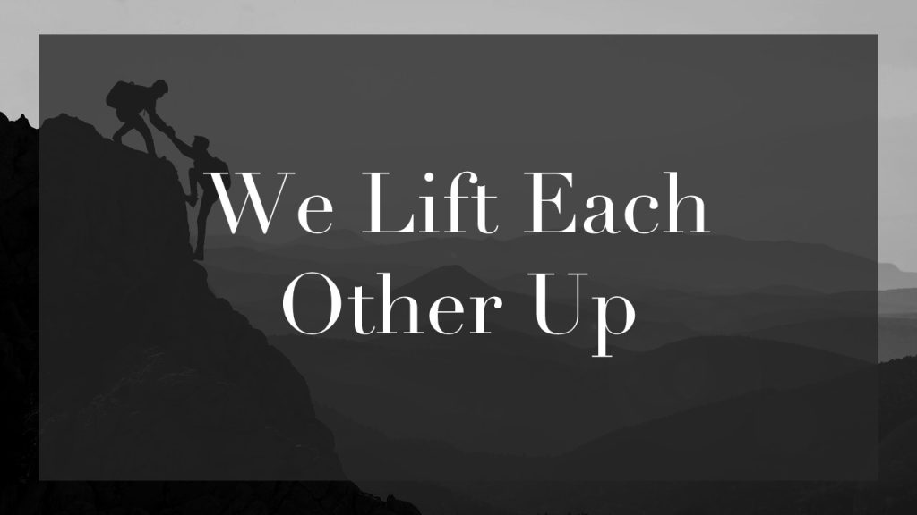 an image of mountain climbers with the text of a core value "we lift each other up"