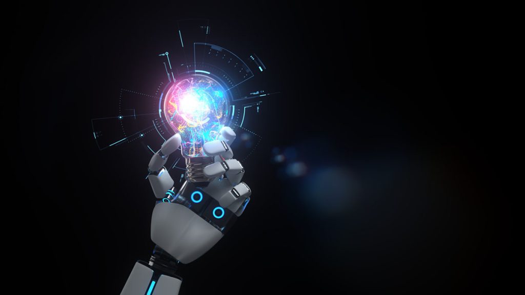 image of a a robotic hand holding a lightbulb