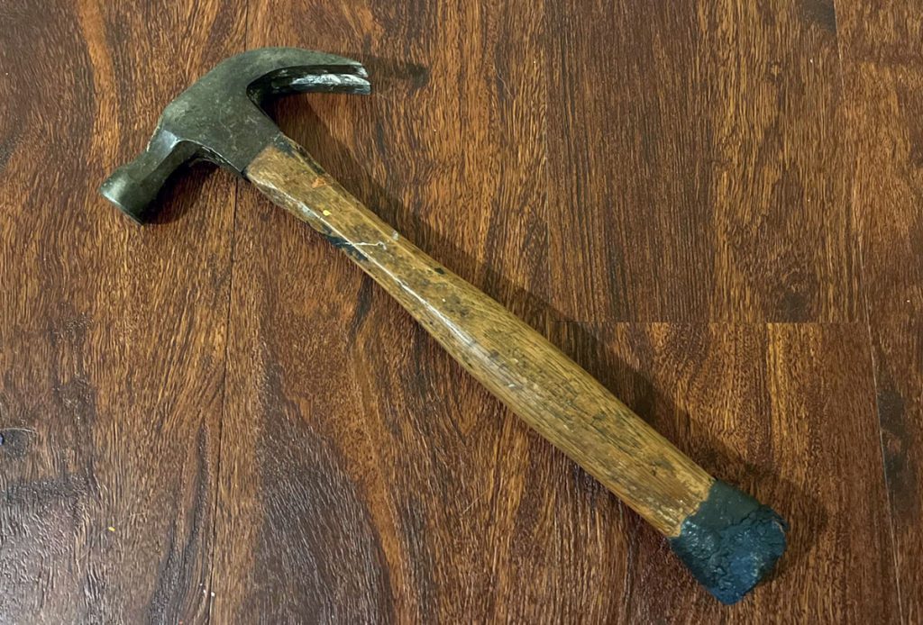 a picture of an old hammer