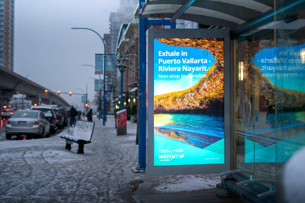 a picture of an outdoor advertisement for travel to mexico