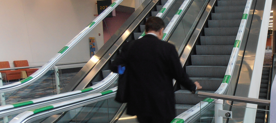 Branded escalator handrails