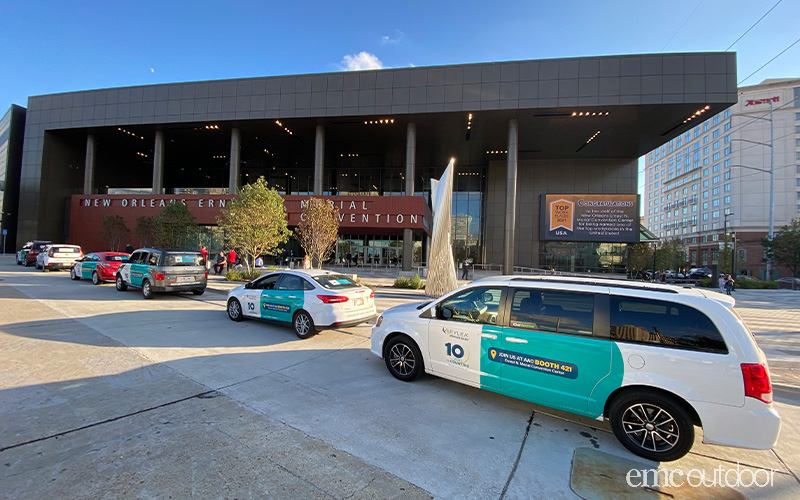 wrapped rideshare in front of convention center for conference