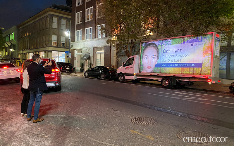 conference mobile billboard next to foot traffic