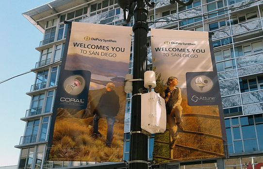 Image of mobile outdoor advertising wallscape for event coverage