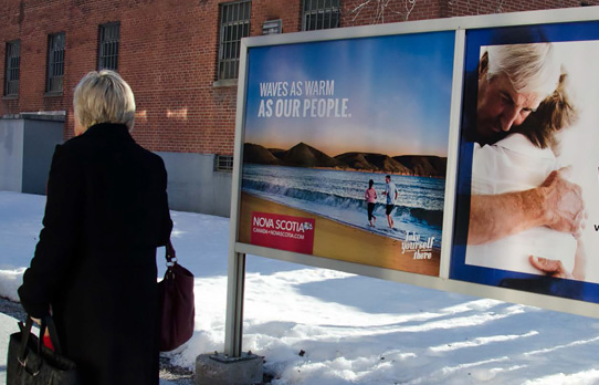 Image of commuter rail platform poster in Boston