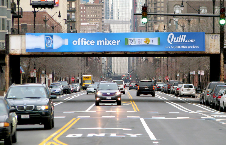 Image of a wrapped rail trestle billboard in Chicago