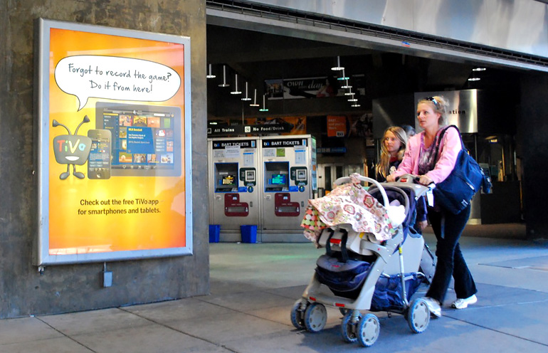 Image of a backlit commuter rail advertising display in San Francisco
