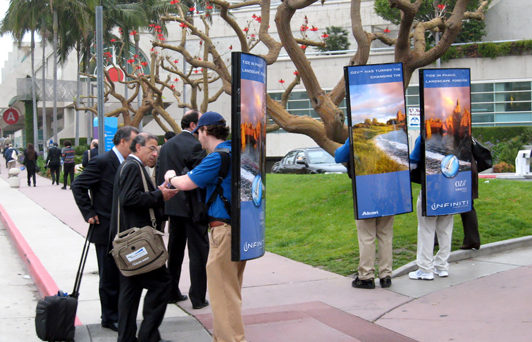 Image of a street team with billboard backpacks in San Diego