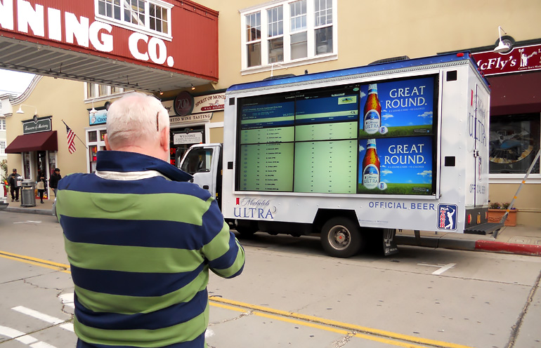 Image of a video mobile billboard used to display real time updates at a sporting event