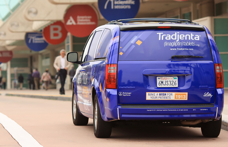 Image of a wrapped vehicle being used to reach event attendees in San Diego